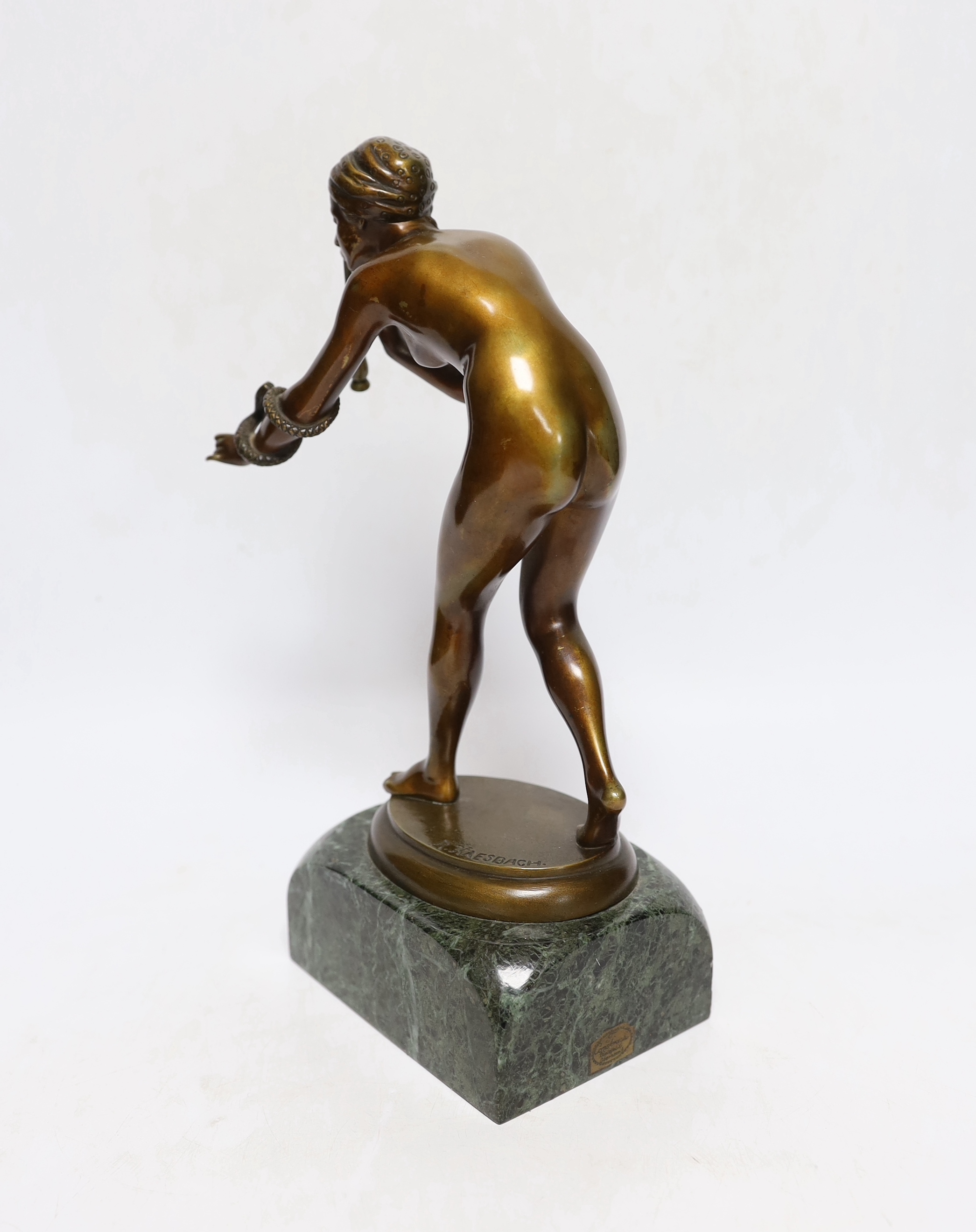After Rudolf Kaesbach (1873-1955), a bronze model of a snake charmer, 29cm